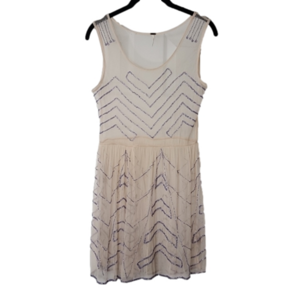 FREE PEOPLE XS sheer cream dress with lavender colored beading. - Picture 1 of 6